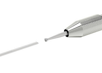 wire end being inserted into cup bur
